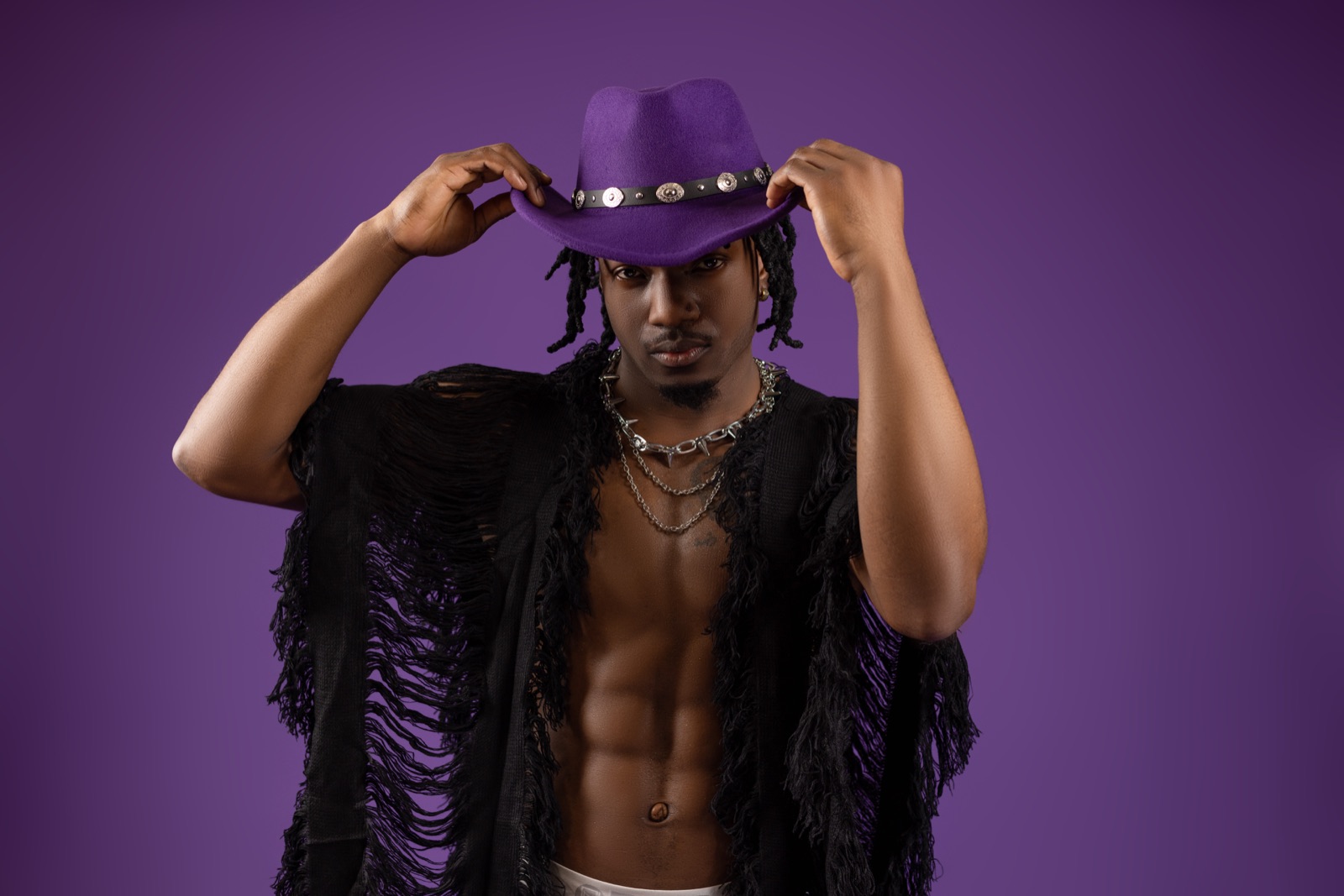Dan G in a purple cowboy hat — Cowboy single art
