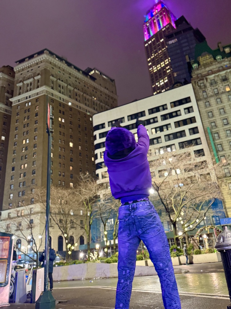 Dan G in purple at night